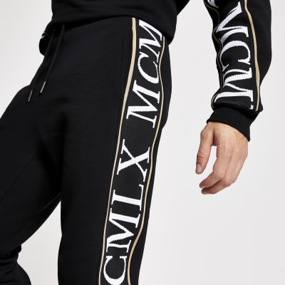 MCMLX black tape slim fit joggers | River Island