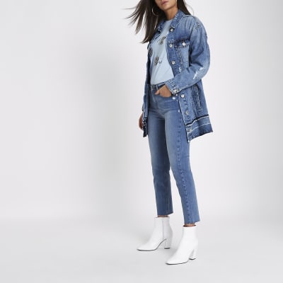 Mid blue distressed released hem denim jacket
