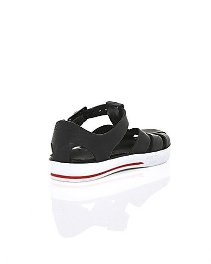 360 degree animation of product Mini boys black jelly caged sandals frame-13