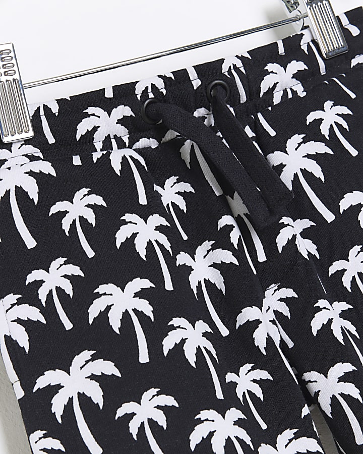 Mini boys black palm tree shorts