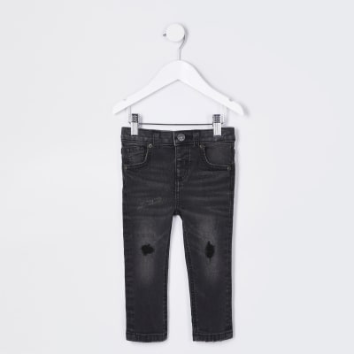 black ripped skinny jeans river island