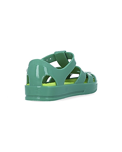 360 degree animation of product Mini boys green caged jelly shoes frame-11