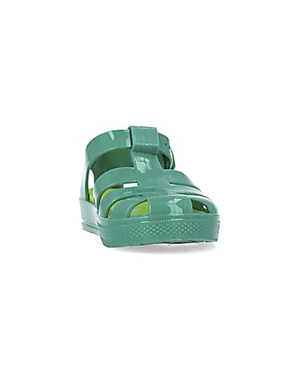 360 degree animation of product Mini boys green caged jelly shoes frame-20