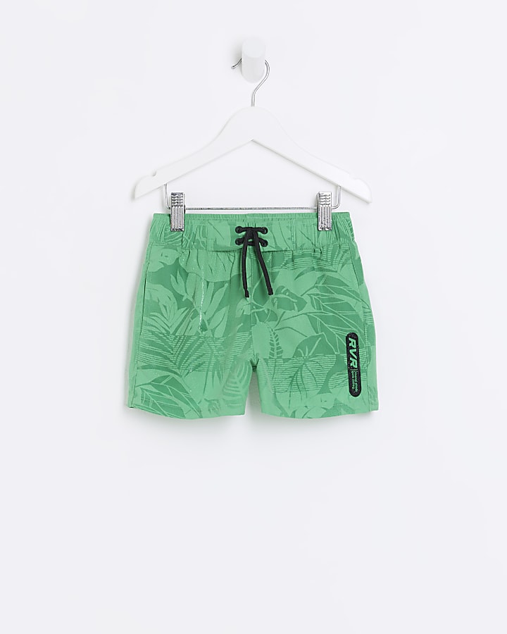 Mini boys green print reveal swim shorts