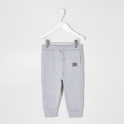 Mini boys grey RIR printed joggers | River Island