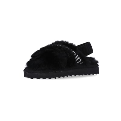360 degree animation of product Mini Girls Black Crossover Faux Fur Slippers frame-1