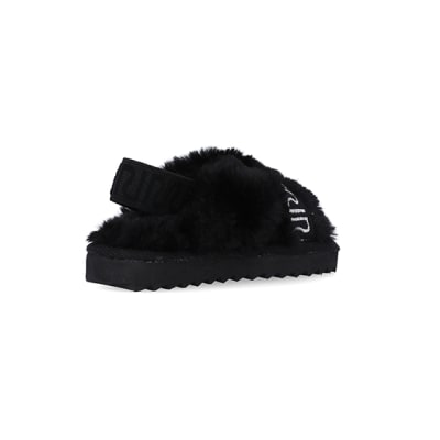 360 degree animation of product Mini Girls Black Crossover Faux Fur Slippers frame-12