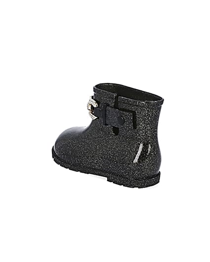360 degree animation of product Mini girls black glitter chain wellie boots frame-6
