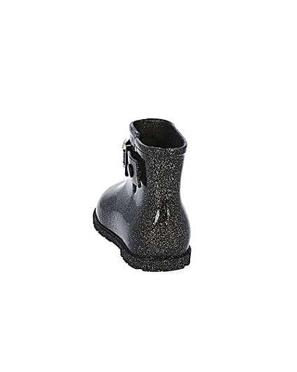 360 degree animation of product Mini girls black glitter chain wellie boots frame-8