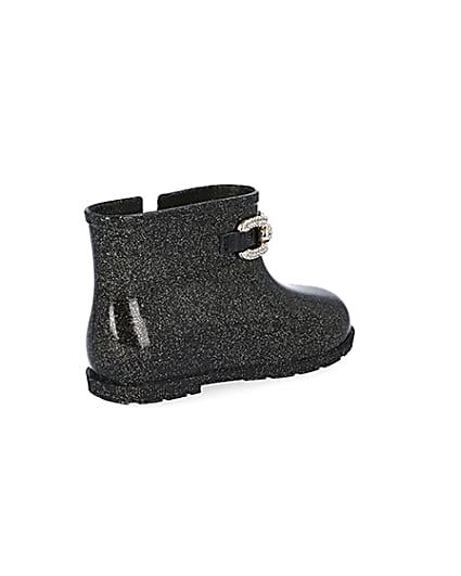 360 degree animation of product Mini girls black glitter chain wellie boots frame-12