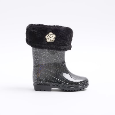 Mini girls black glitter wellie boots River Island