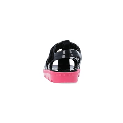360 degree animation of product Mini girls black RI jelly sandals frame-9