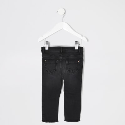 girls black ripped jeggings