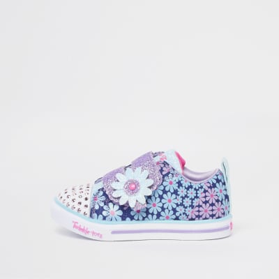 مفيد سحق ذلك  Mini girls blue Skechers floral glitter shoes | River Island