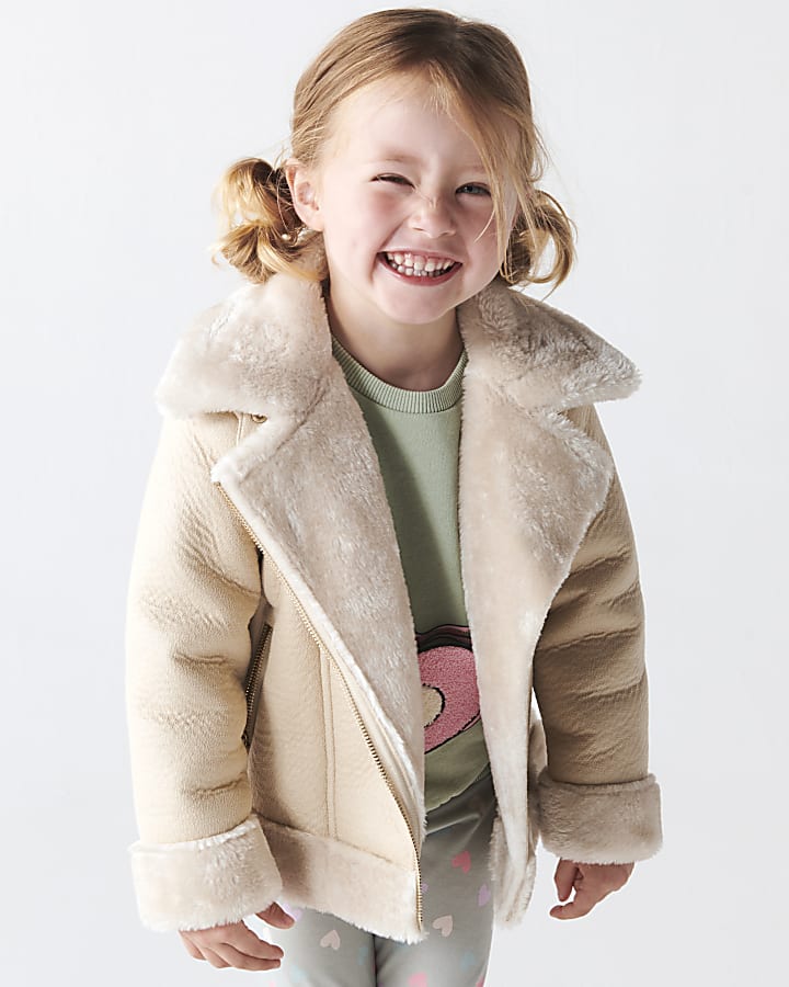 Mini girls cream faux fur aviator jacket | River Island