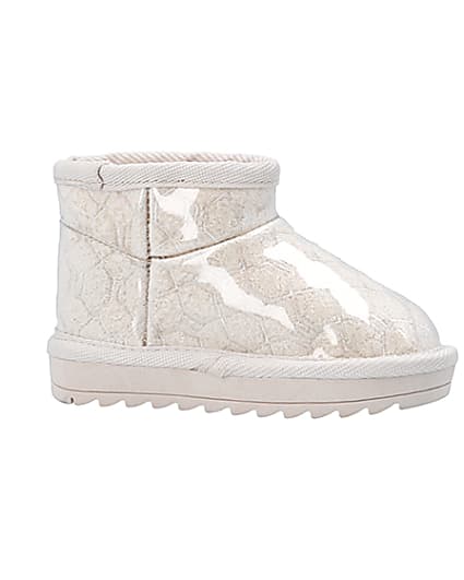 360 degree animation of product Mini Girls Cream Faux Fur Lined Ankle Boots frame-16