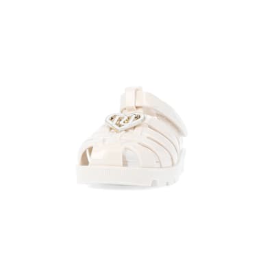 360 degree animation of product Mini girls cream RI jelly sandals frame-22