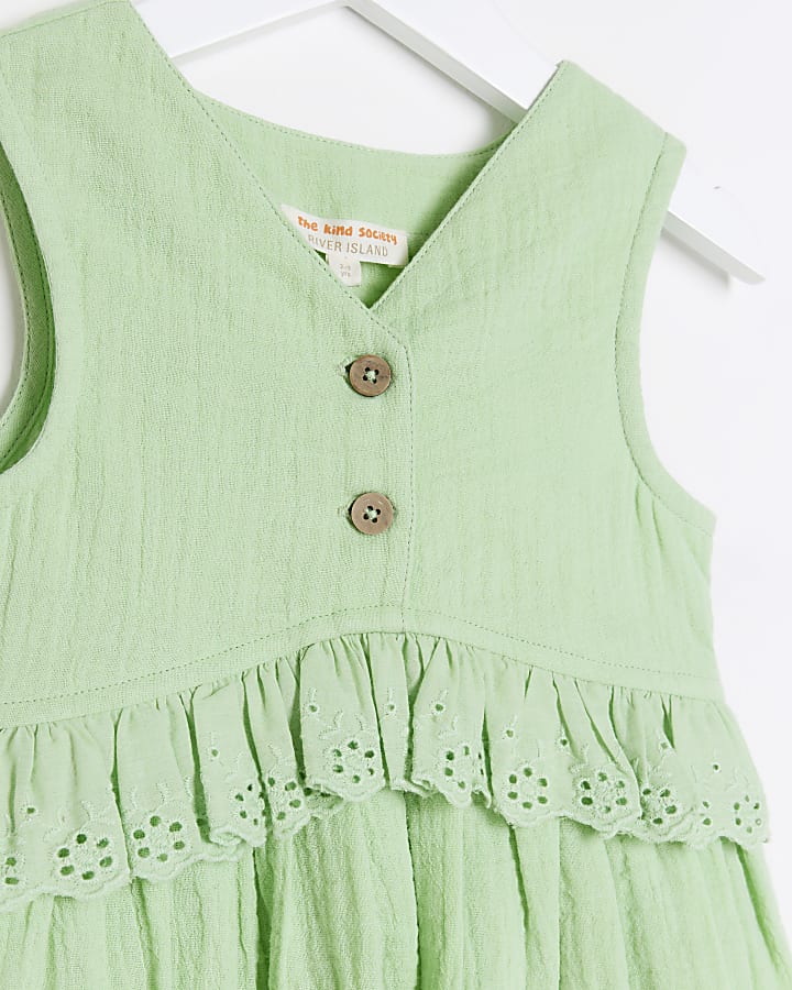 Mini girls green broderie detail peplum dress