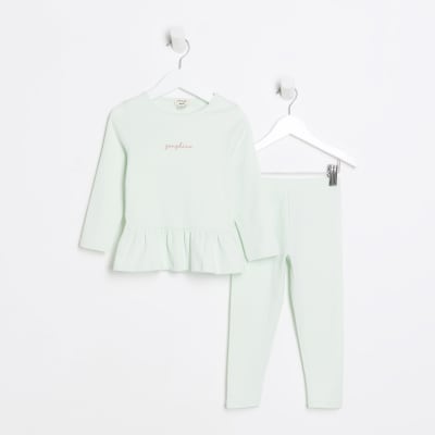 Mini girls green peplum top and leggings set River Island