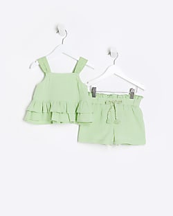 Mini girls green peplum top and shorts set