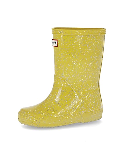 360 degree animation of product Mini girls Hunter yellow glitter wellie boots frame-2