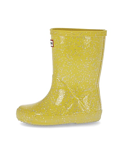 360 degree animation of product Mini girls Hunter yellow glitter wellie boots frame-3