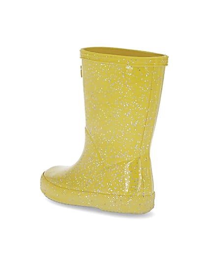 360 degree animation of product Mini girls Hunter yellow glitter wellie boots frame-6