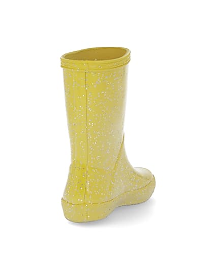 360 degree animation of product Mini girls Hunter yellow glitter wellie boots frame-11