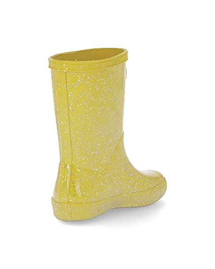 360 degree animation of product Mini girls Hunter yellow glitter wellie boots frame-12
