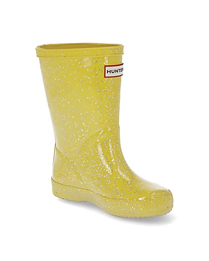 360 degree animation of product Mini girls Hunter yellow glitter wellie boots frame-18