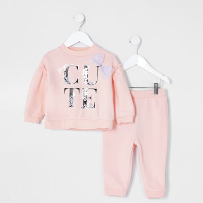 Mini girls pink bow 'Cute' sweat outfit | River Island