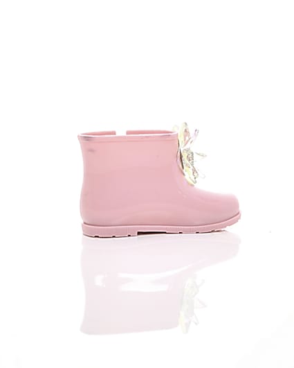 360 degree animation of product Mini girls pink patent 3D embellished wellies frame-11