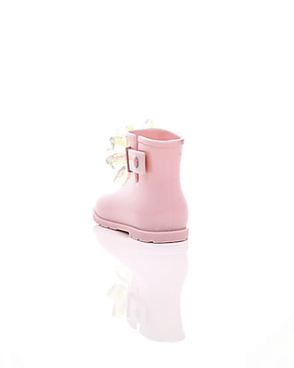 360 degree animation of product Mini girls pink patent 3D embellished wellies frame-17
