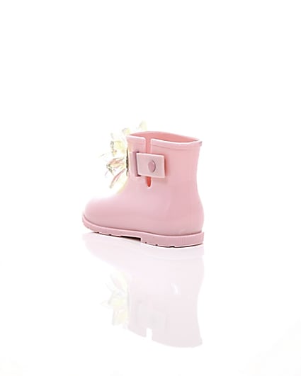 360 degree animation of product Mini girls pink patent 3D embellished wellies frame-18