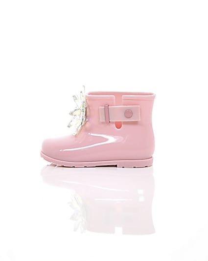 360 degree animation of product Mini girls pink patent 3D embellished wellies frame-21