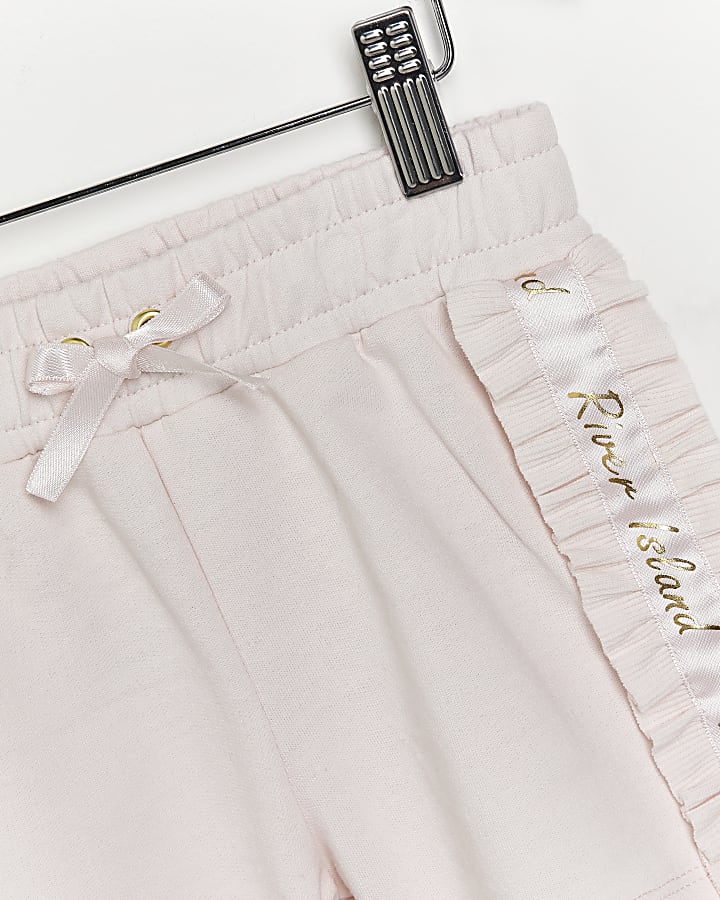Mini girls pink ruffle satin trim shorts