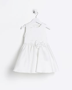 Mini girls white bow skater dress