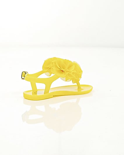 360 degree animation of product Mini girls yellow ruffle jelly sandals frame-12
