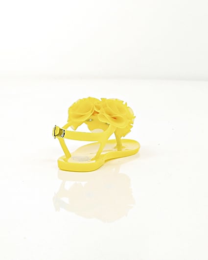 360 degree animation of product Mini girls yellow ruffle jelly sandals frame-14
