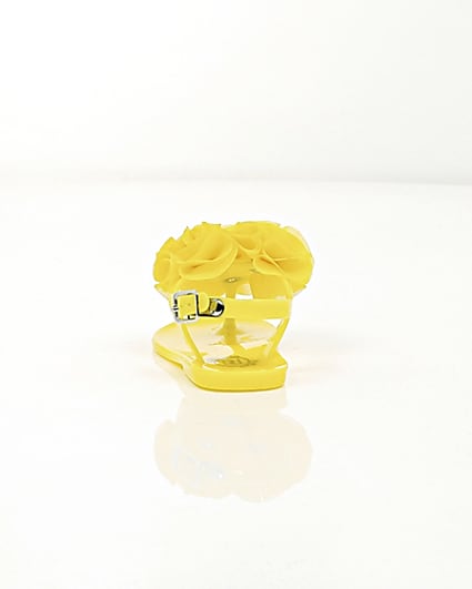 360 degree animation of product Mini girls yellow ruffle jelly sandals frame-16