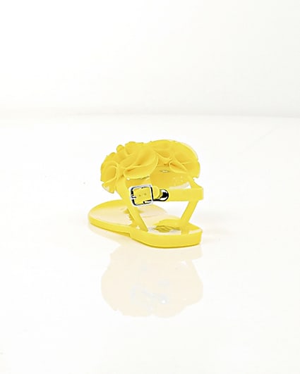 360 degree animation of product Mini girls yellow ruffle jelly sandals frame-17