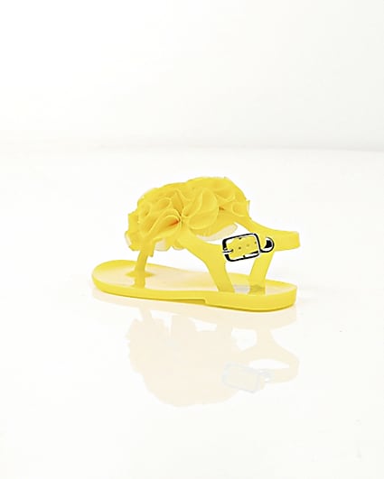 360 degree animation of product Mini girls yellow ruffle jelly sandals frame-19