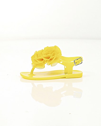360 degree animation of product Mini girls yellow ruffle jelly sandals frame-22