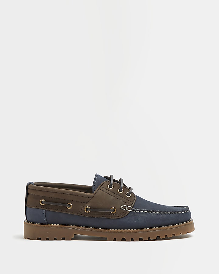 Navy and brown leather cleated boat shoes