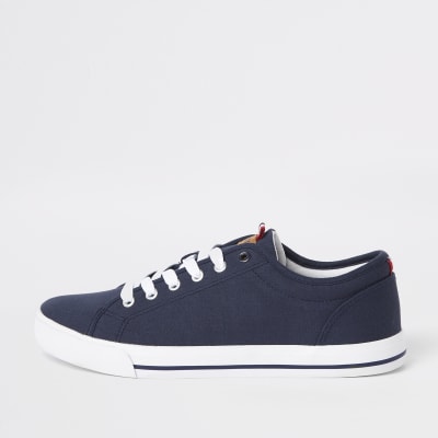 Navy canvas lace-up plimsolls