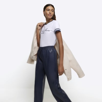 Navy faux leather wide leg trousers | River Island