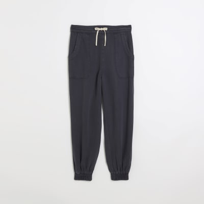 Navy lyocell cuffed joggers River Island