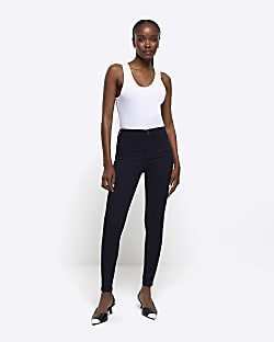 Navy molly mid rise skinny jeans