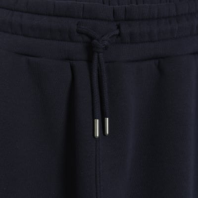 Navy Regular Fit Graphic tracksuit Joggers | River Island
