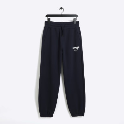 Navy Regular Fit Graphic tracksuit Joggers | River Island